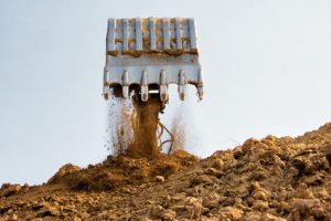 Excavator bucket on sky, Industrial excavator machine